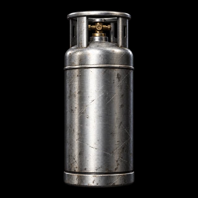Upright weathered silver steel fuel canister inside a protective collar, with an exposed brass valve and no red hardware